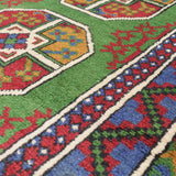Afghan carpet, approximately 85cm x 195cm