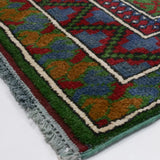 Afghan carpet, approximately 85cm x 195cm
