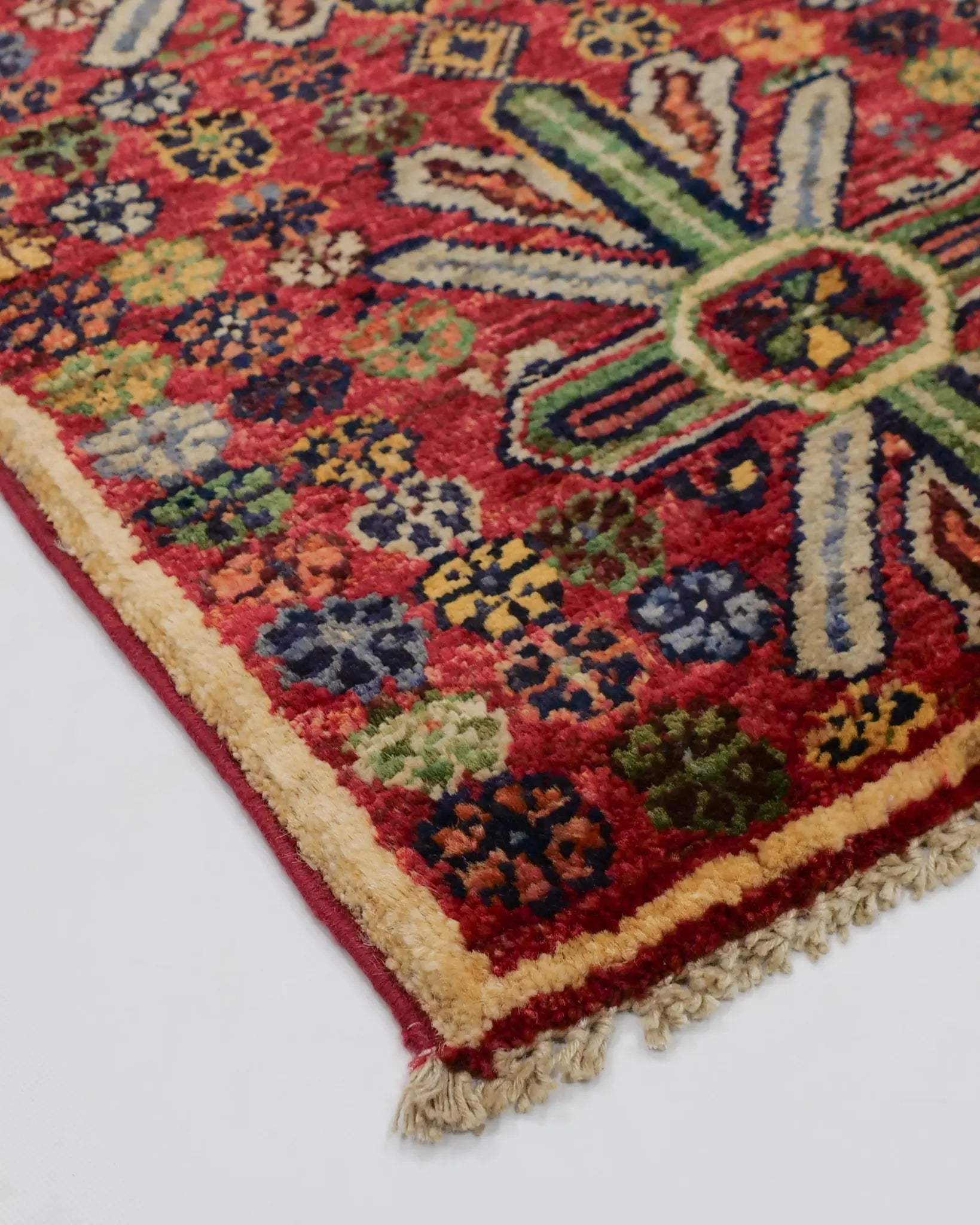 Afghan Ghazni wool handmade rug with geometric floral motifs