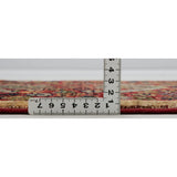 アートのような幾何学柄が特徴のアフガン手織り絨毯の厚み