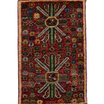 ガズニウールの手織り絨毯 レッドベース 幾何学と花模様