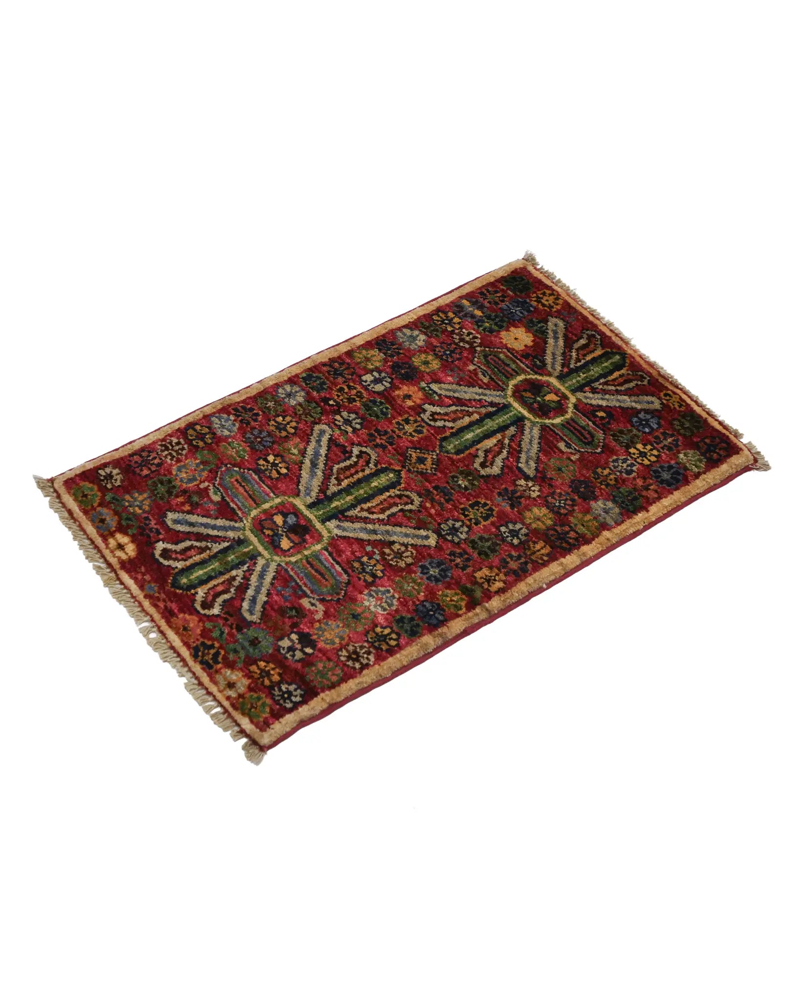 Rich red Afghan Ghazni wool rug with colorful pattern