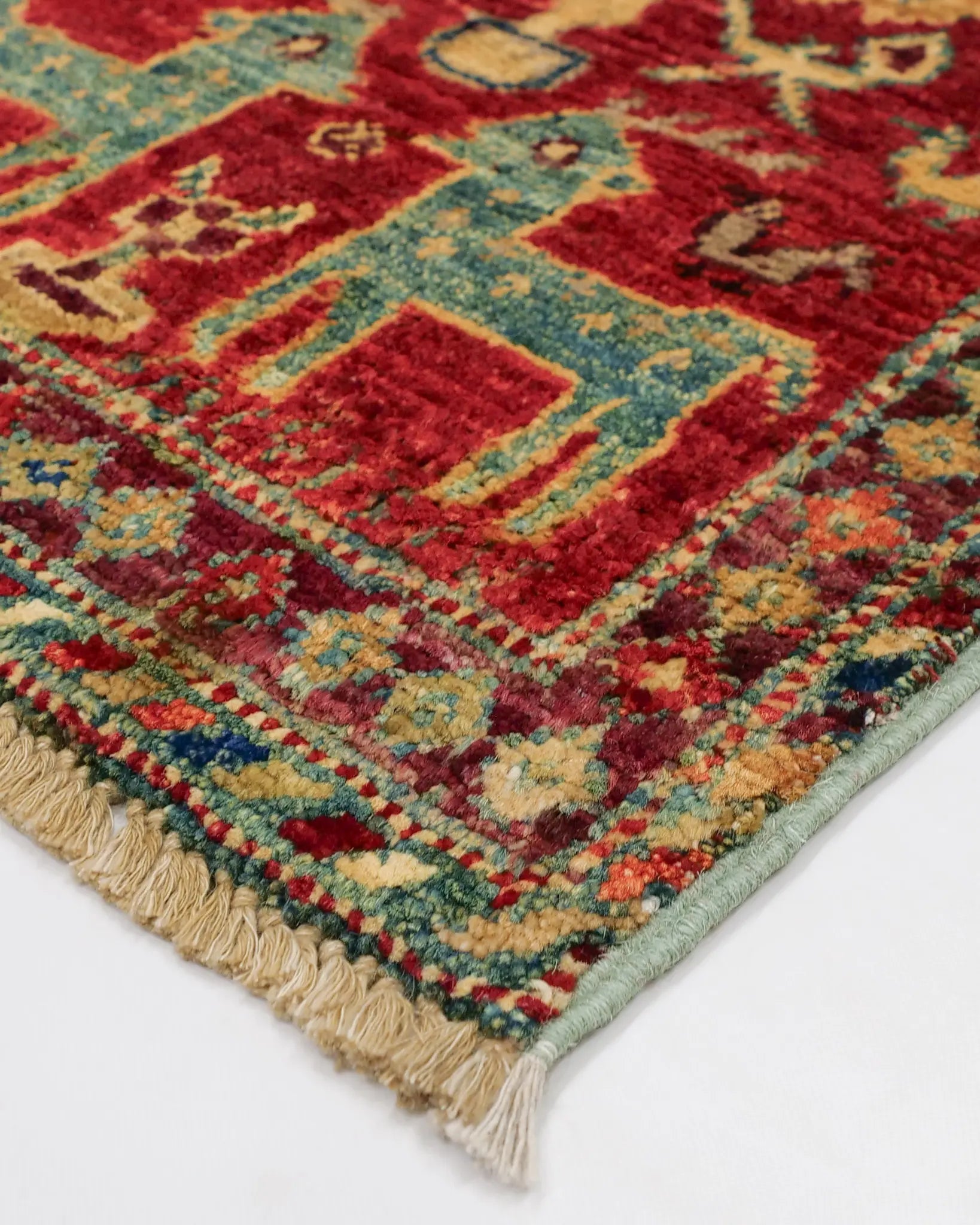 Afghan handmade Ghazni wool rug with deer and bird motifs