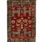 ガズニウールの手織り絨毯 赤地に鹿と鳥のモチーフ