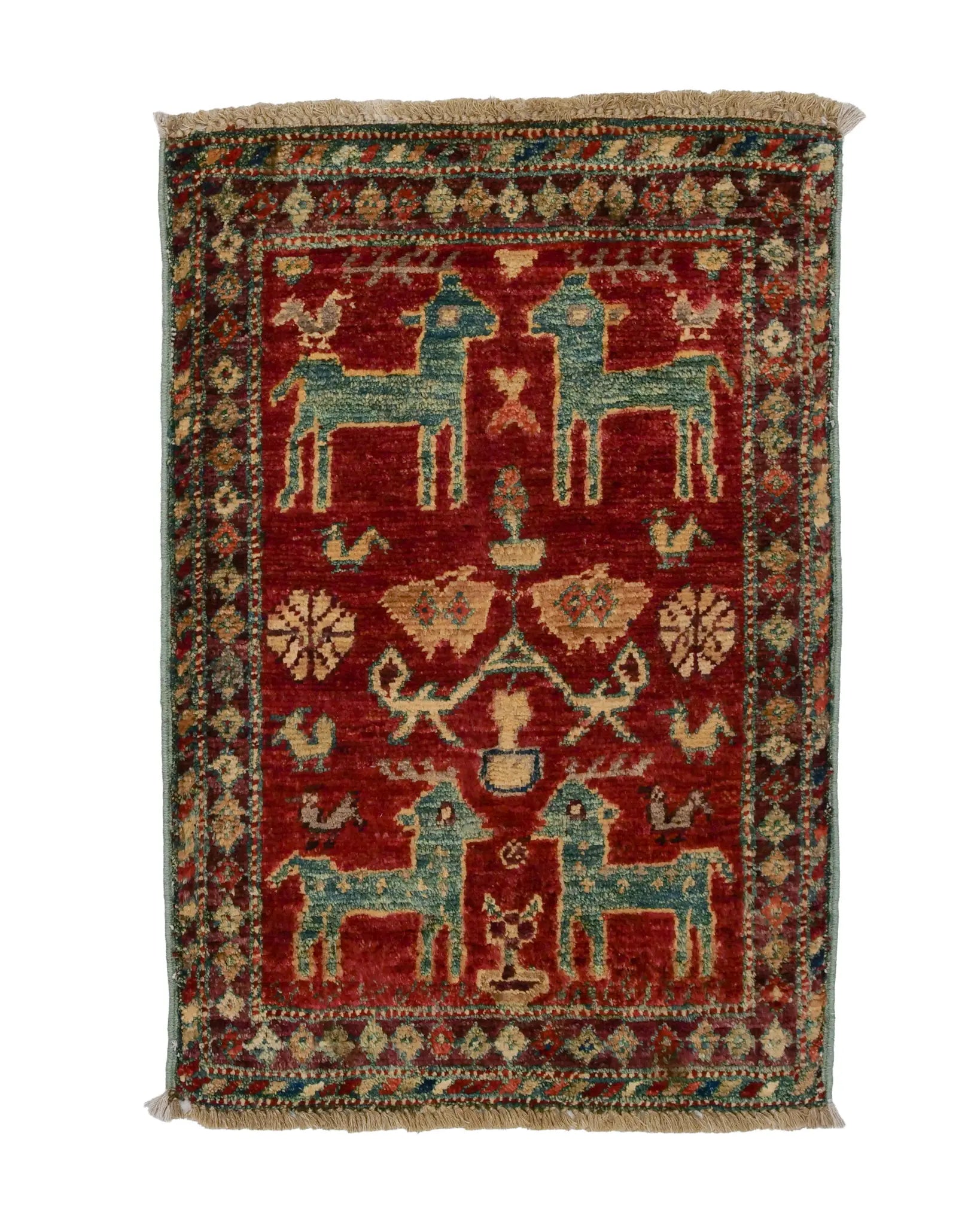 ガズニウールの手織り絨毯 赤地に鹿と鳥のモチーフ