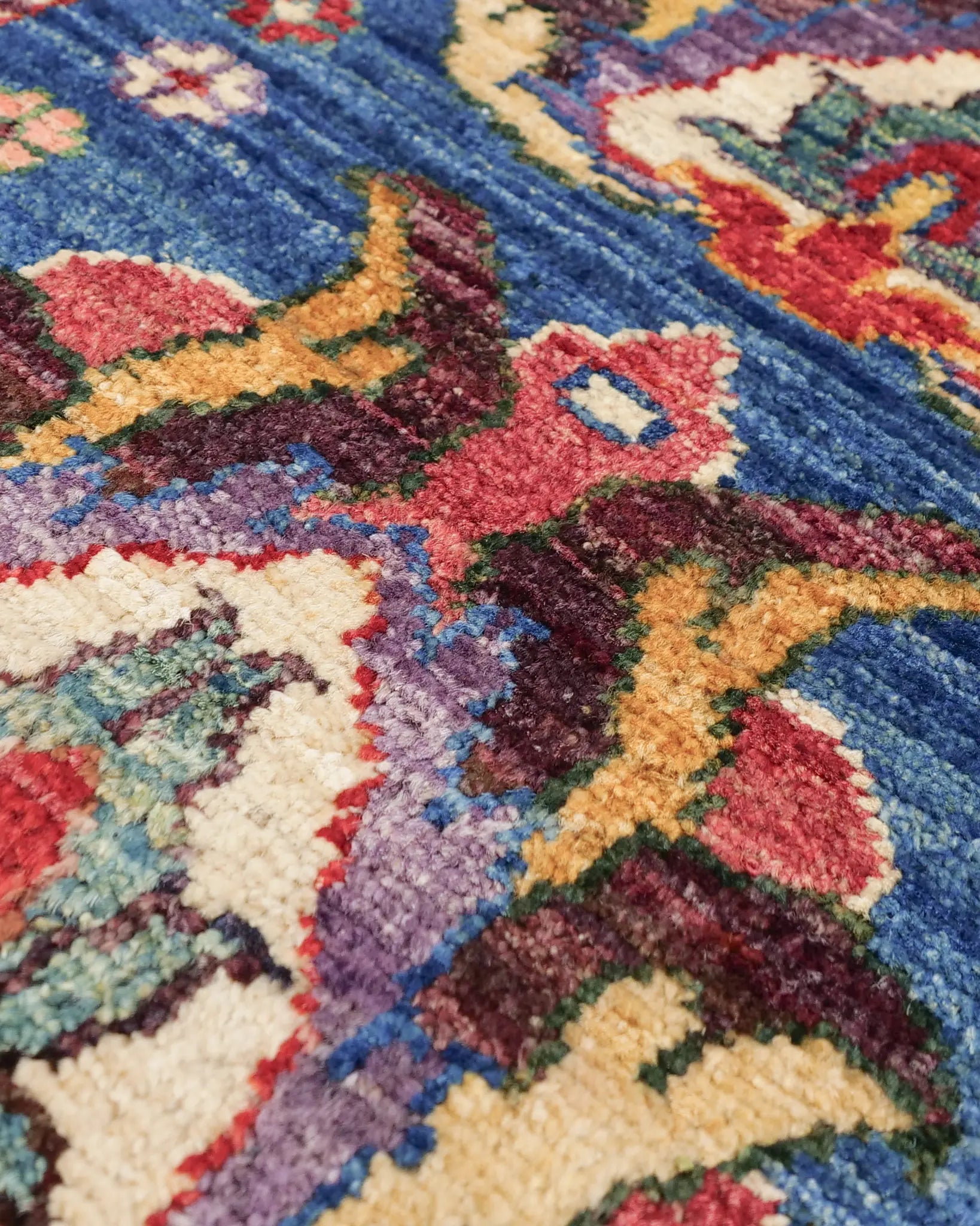 Afghan handmade Ghazni wool rug with twin palmette motifs