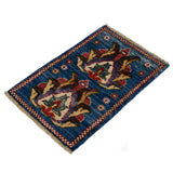 Blue Afghan Ghazni wool rug with floral palmette design