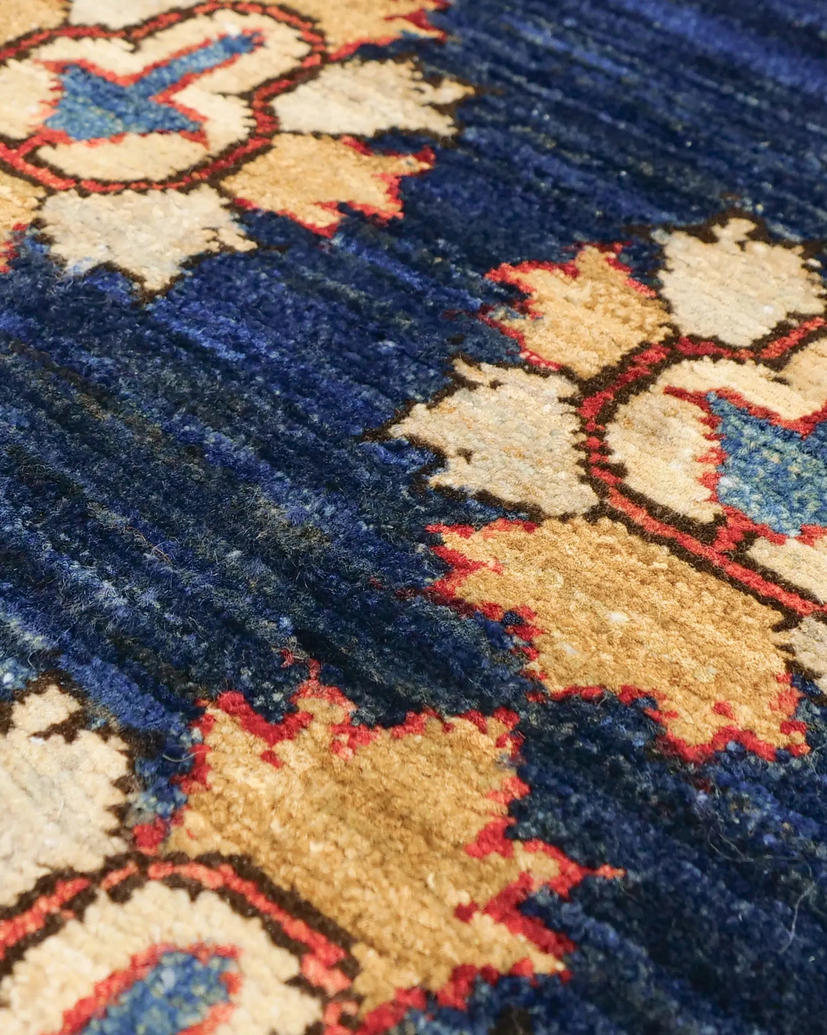 Afghan handmade Ghazni wool rug with palmette motifs