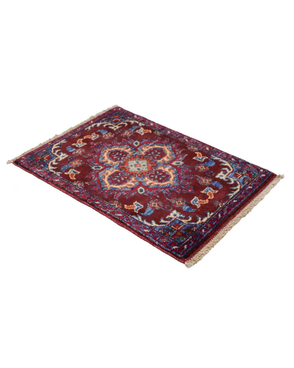 Afghan handmade rug with diamond-shaped medallion