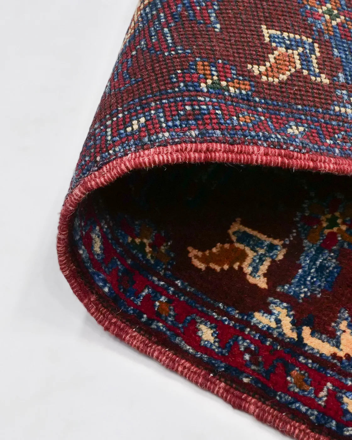 Diamond medallion Afghan rug in deep burgundy red