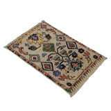 Afghan handmade Ghazni wool rug with floral and geometric design