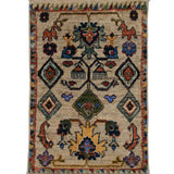 ガズニウールの手織り絨毯 ベージュ地に花と幾何学模様