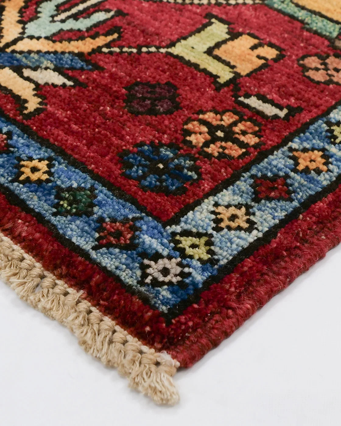 Guldani motif Afghan rug with symmetrical vase pattern