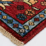 Guldani motif Afghan rug with symmetrical vase pattern