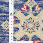 ネイビー地に二種類のひし形模様が規則的に並んだラホール産手織りパキスタン絨毯