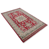 赤地に大きなメダリオンが織り込まれたラホール産手織りパキスタン絨毯