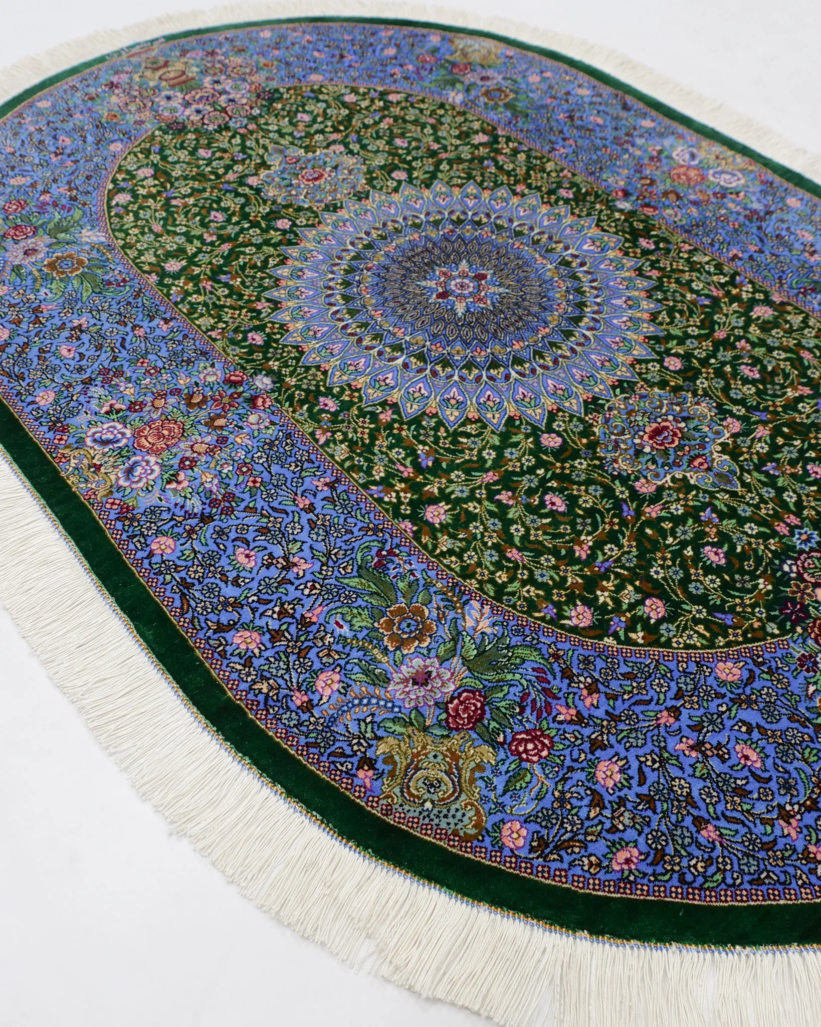 ペルシャ絨毯 クム産 シラジ工房 シルク手織りラグ(楕円形 80×119cm)ブルー×グリーン 花瓶と花模様入り 玄関マットにも最適