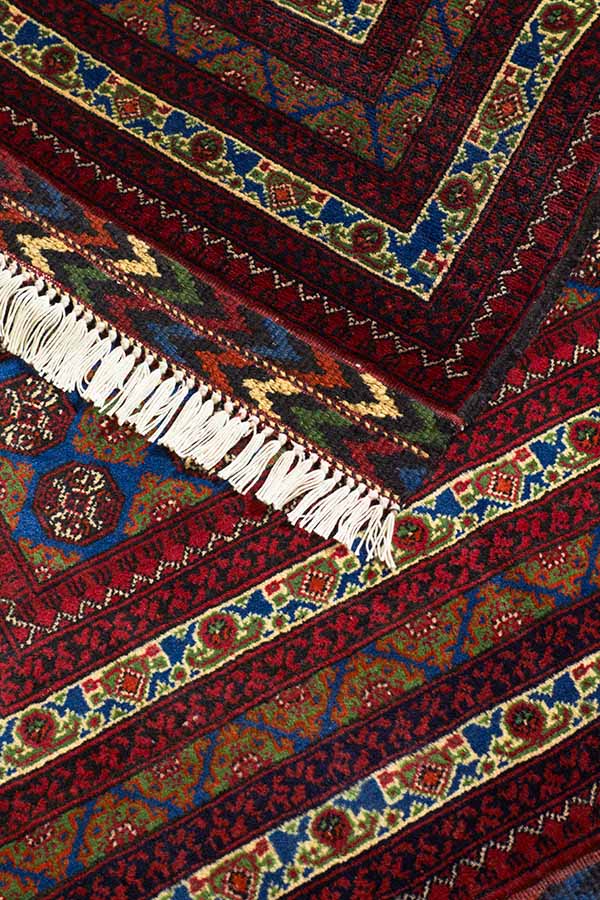 アフガニスタンのトルクメン族によって手織りされたトライバルラグ - 伝統的なホジャロシュナイ絨毯