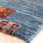 イラン・シーラーズ産の手織りペルシャ絨毯 ギャッベ 50×80cm 淡いブルーに木々のデザイン