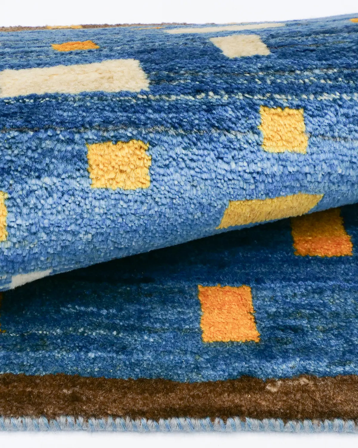 長方形の模様がリズミカルに配置されたデザインギャッベ