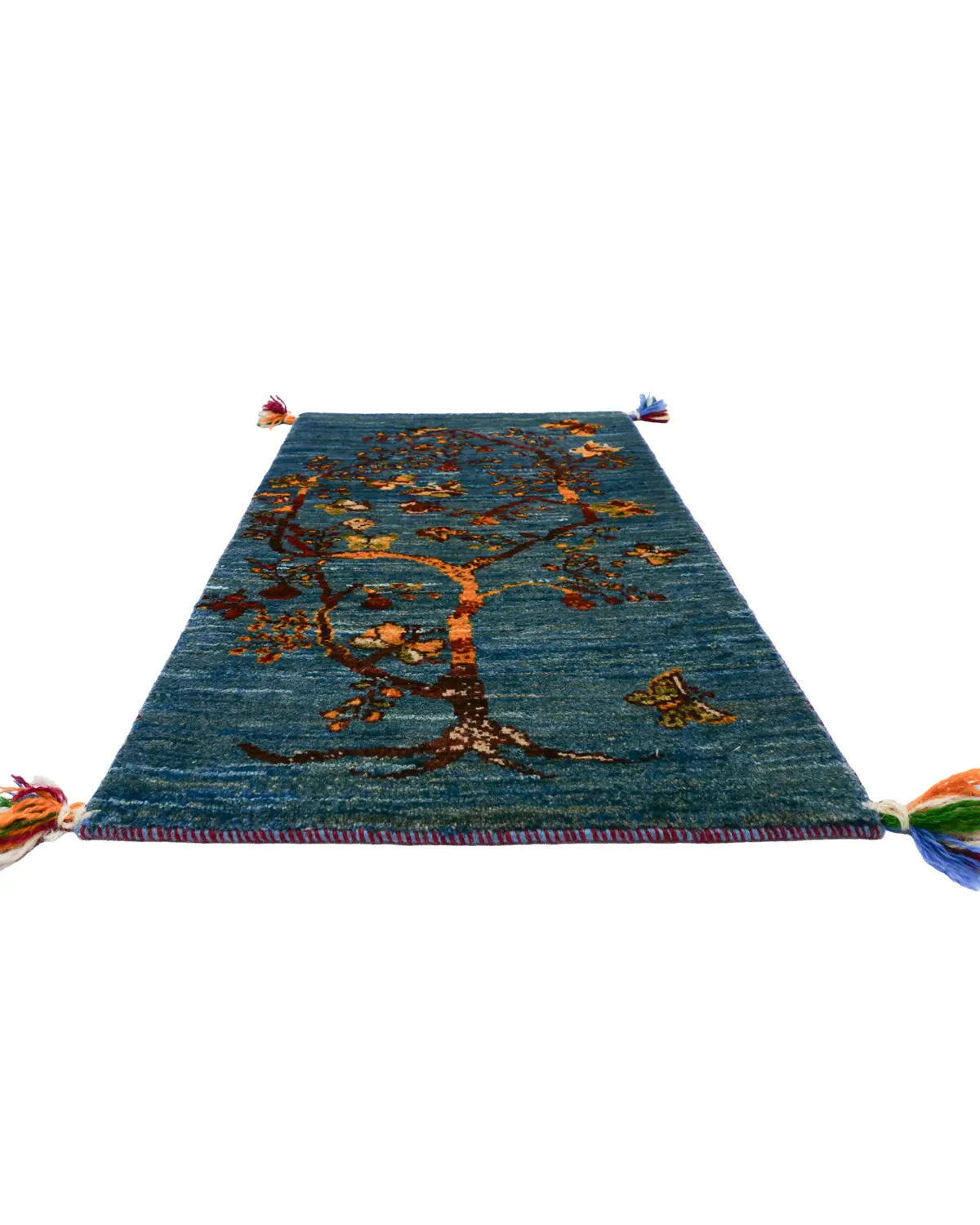 鮮やかな青とオレンジのコントラストが印象的なギャッベ