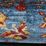 空に向かって枝を伸ばす樹をモチーフにしたギャッベラグ