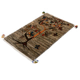 落ち着いたグレー地にオレンジの幹が映える美しいギャッベ