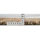 木の枝に花咲き蝶が舞う、自然の調和を表現したギャッベマットの厚み