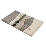 砂漠の風景を描いたギャッベ、ラクダと椰子の木が印象的