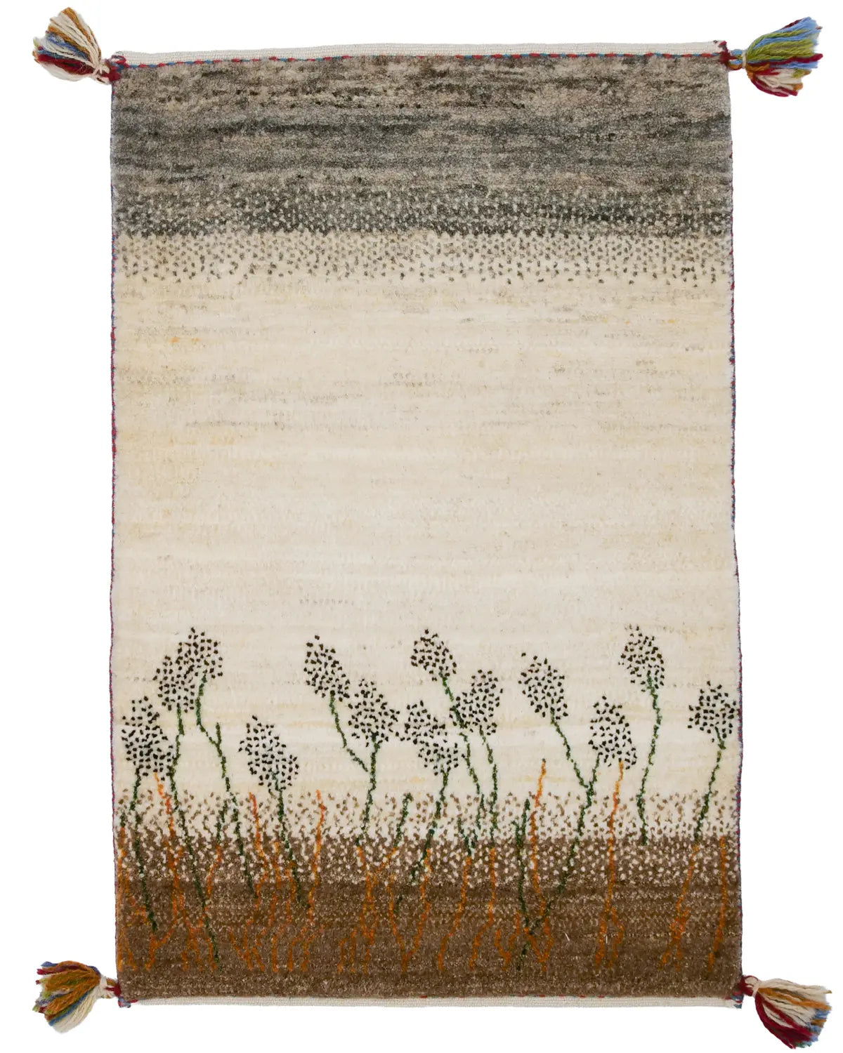 草原に立つ花穂がやさしいグラデーションの空の下に揺れる風景を織り込んだギャッベ