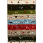 黒・緑・青・赤の横縞にラクダが織り込まれたカラフルギャッベ。