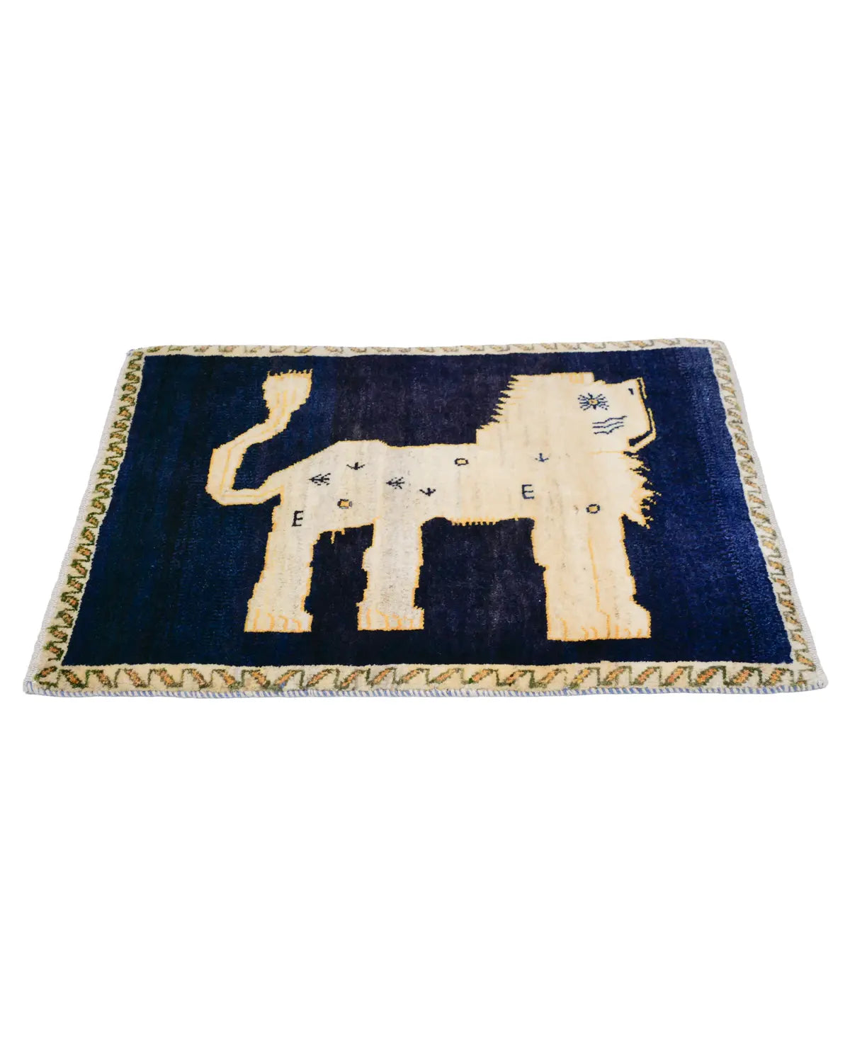 ネイビーフィールドのライオンギャッベ 手織りラグ