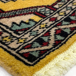 黄色のパキスタン絨毯のフリンジ