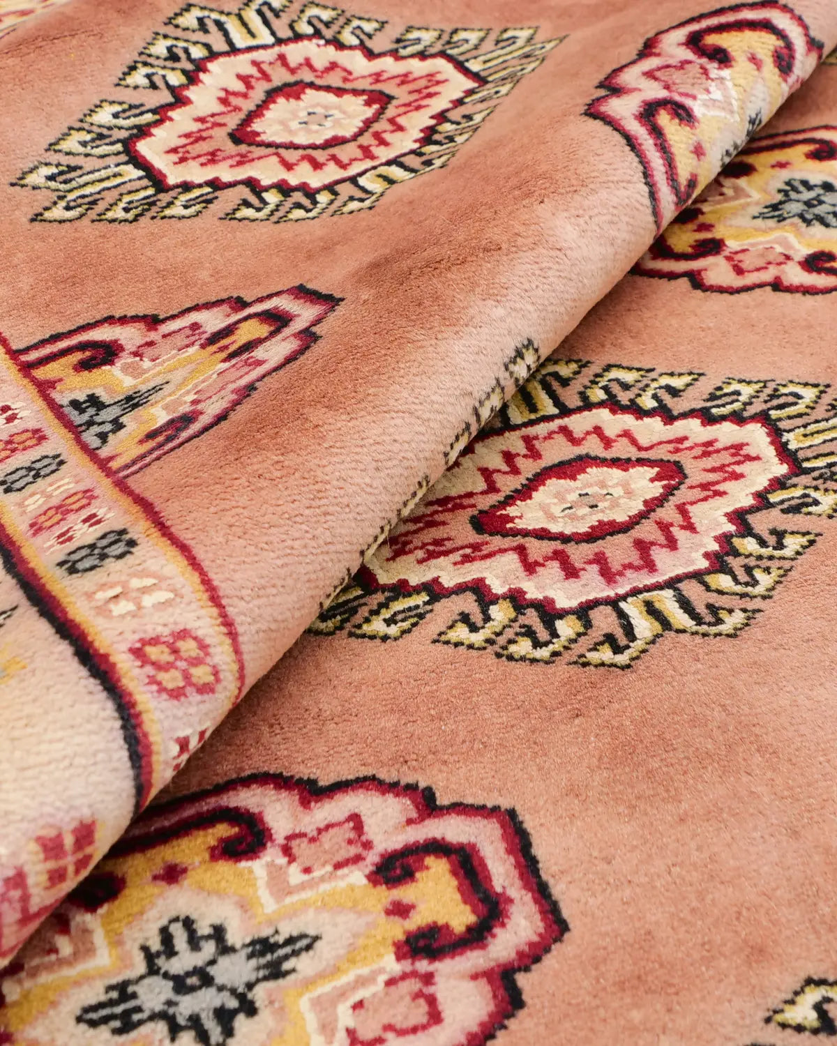 パキスタンラグ 花のような幾何学模様 ウール