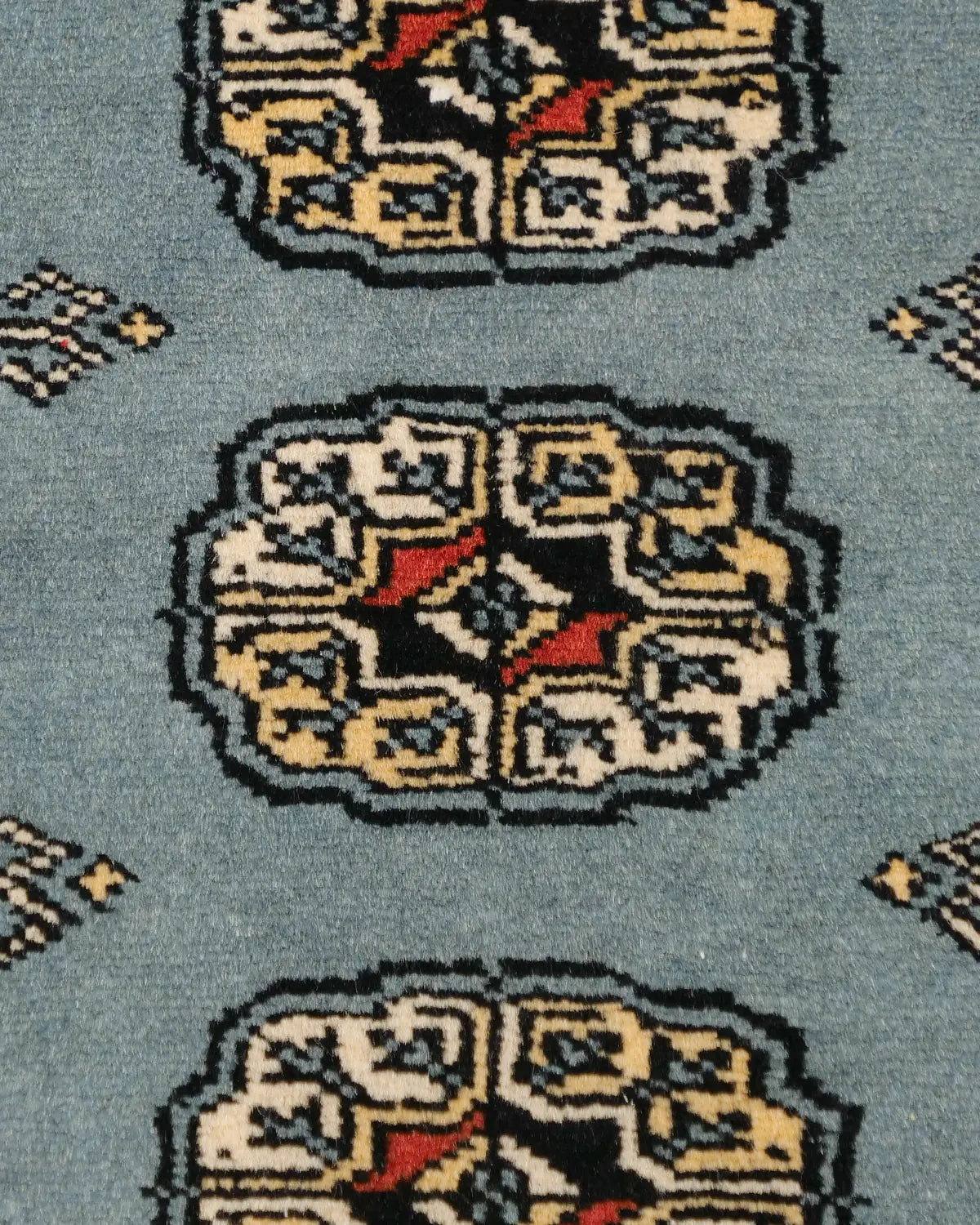 パキスタン絨毯 青系 ブルー ボハラ柄 象の足跡モチーフ 小型ラグ