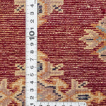 赤地に菱形文様が並ぶラホール産パキスタン絨毯 