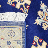 ネイビー地に二種類のひし形模様が規則的に並んだラホール産手織りパキスタン絨毯