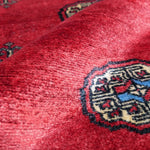 象の足跡文様が並ぶボハラ柄パキスタン絨毯