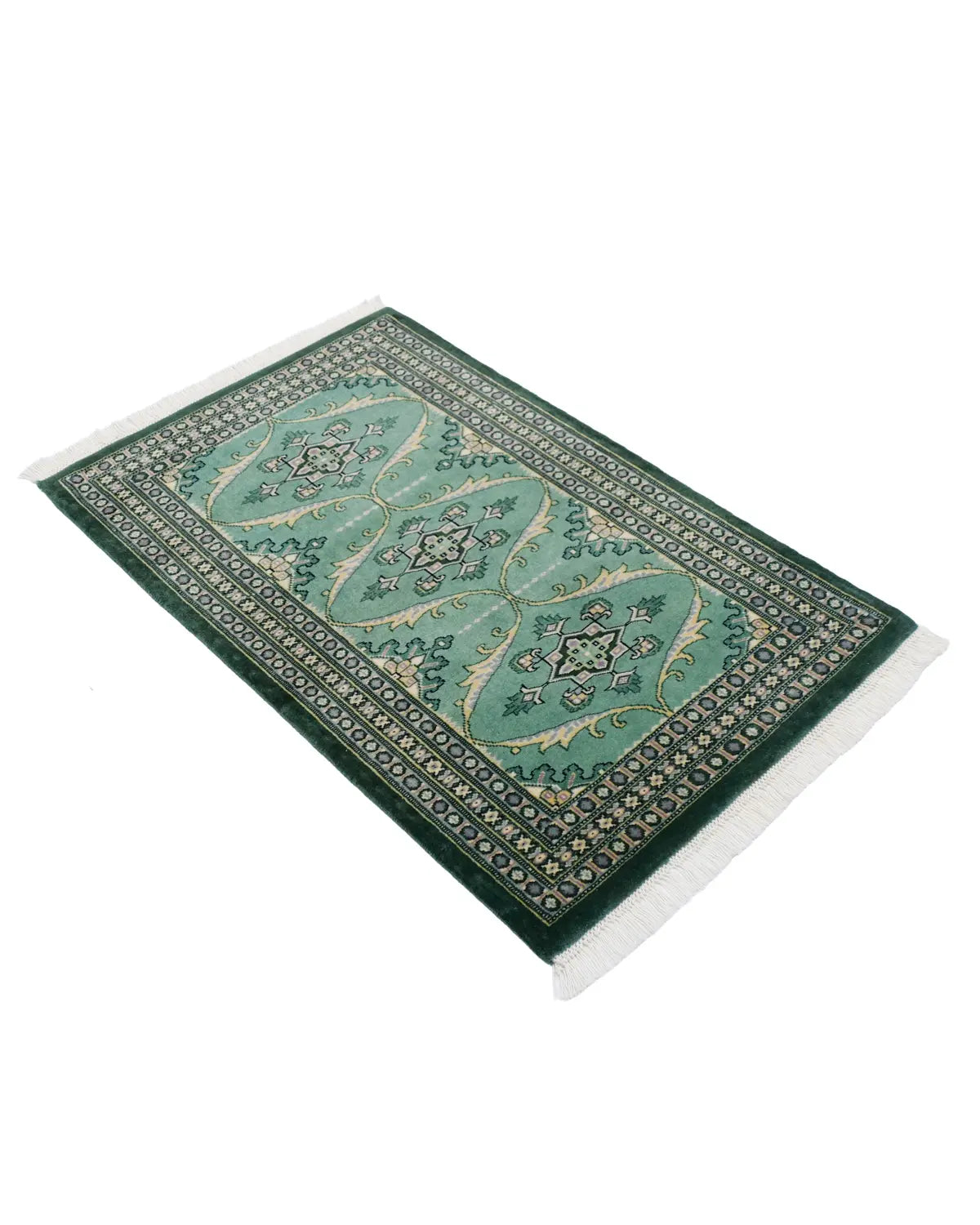 深みのあるグリーンが美しいパキスタン・ラホールの手織り絨毯