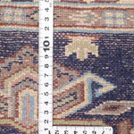 リビングに上品な印象を添えるネイビーの手織りウールラグ