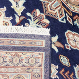 Wool handwoven carpet from Lahore in sophisticated navy tones