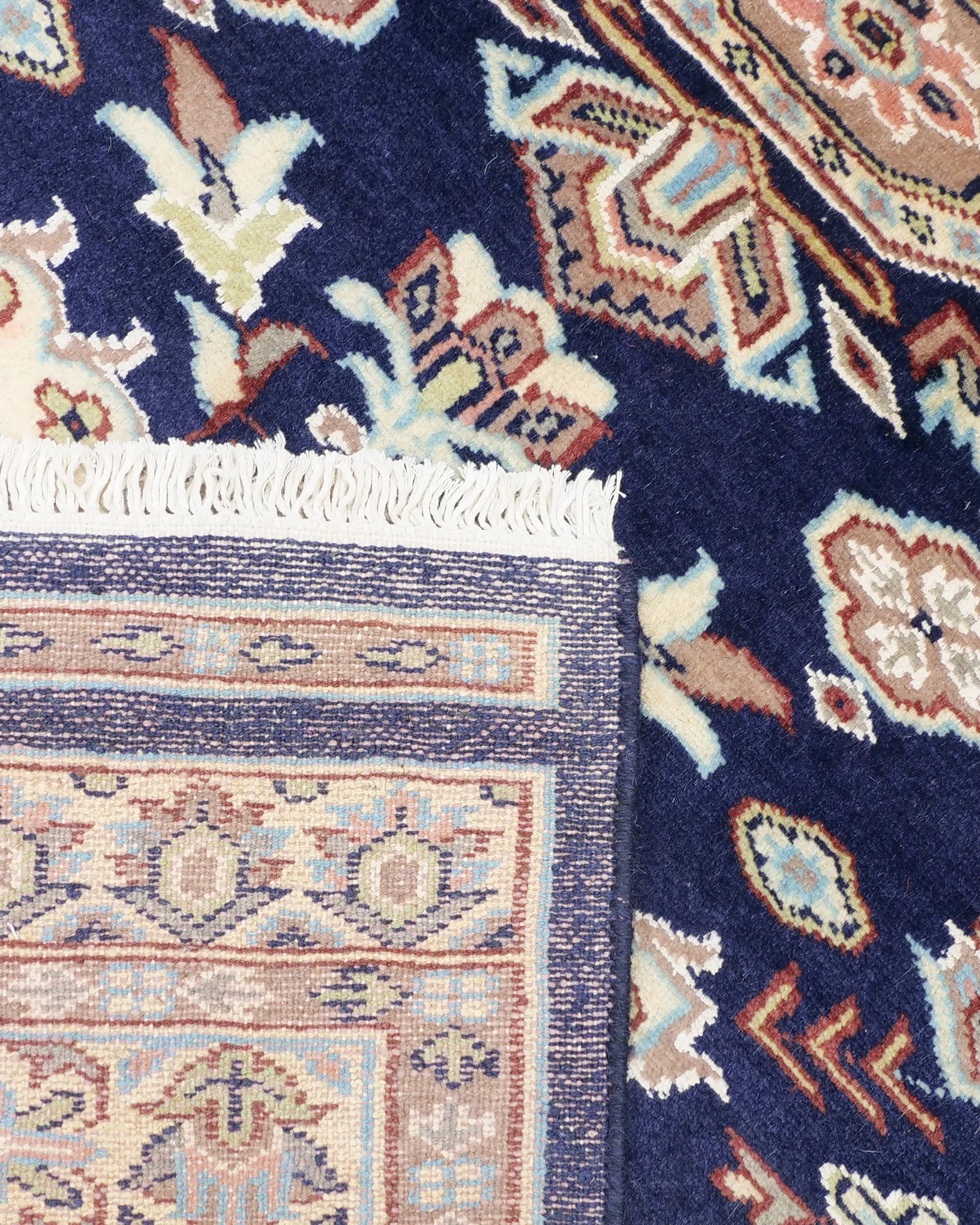 Wool handwoven carpet from Lahore in sophisticated navy tones