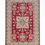 赤地に大きなメダリオンが織り込まれたパキスタン絨毯