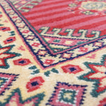 パキスタン・ラホール産の手織り絨毯。赤を基調にしたジャルダール柄とストライプ模様の伝統デザイン。