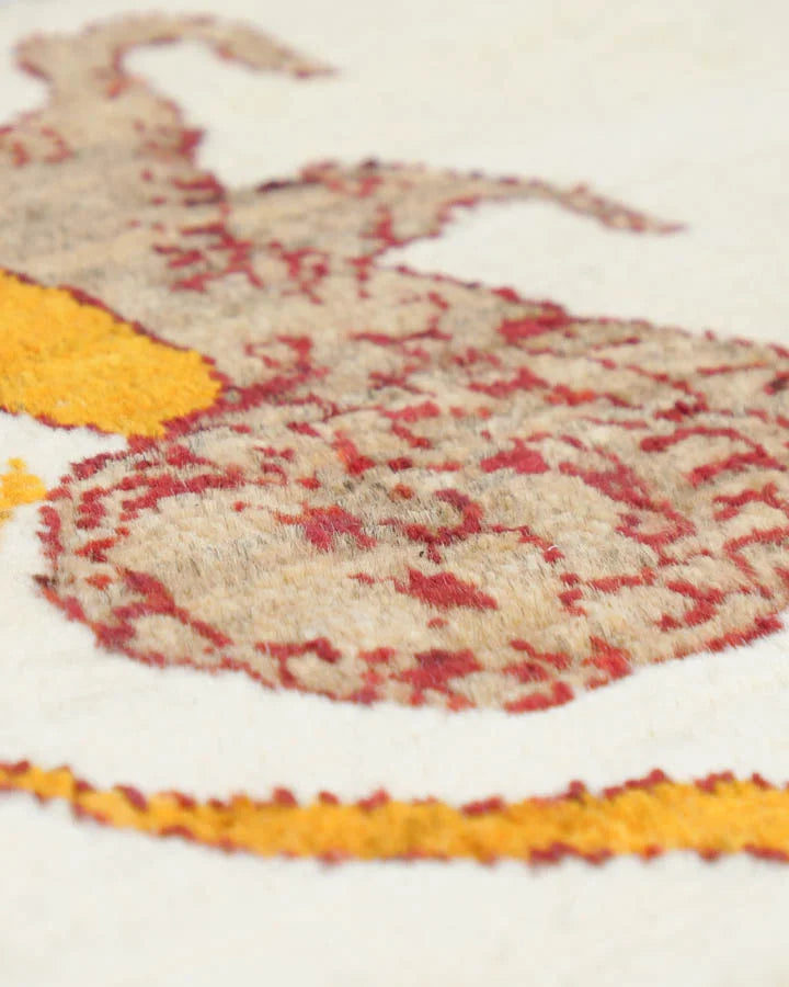 アイボリー×オレンジのライオンラグ