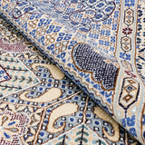 ナイン産ウール手織りラグ 格調あるデザイン