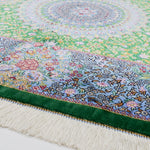 ペルシャ絨毯 クム産 シラジ工房 シルク手織りラグ（楕円形 80×119cm）ブルー×グリーン 花瓶と花模様入り 玄関マットにも最適
