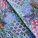 紫の色彩が印象的なクム産シルクペルシャ絨毯 花柄