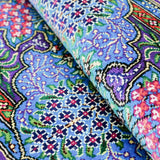 紫の色彩が印象的なクム産シルクペルシャ絨毯 花柄