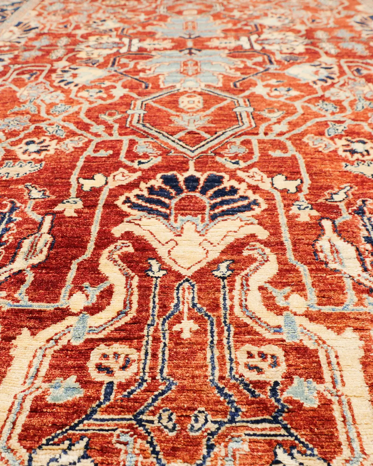 アフガニスタン産絨毯 青い外枠 赤フィールド